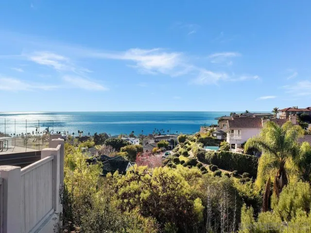 a front view of house with outdoor seating