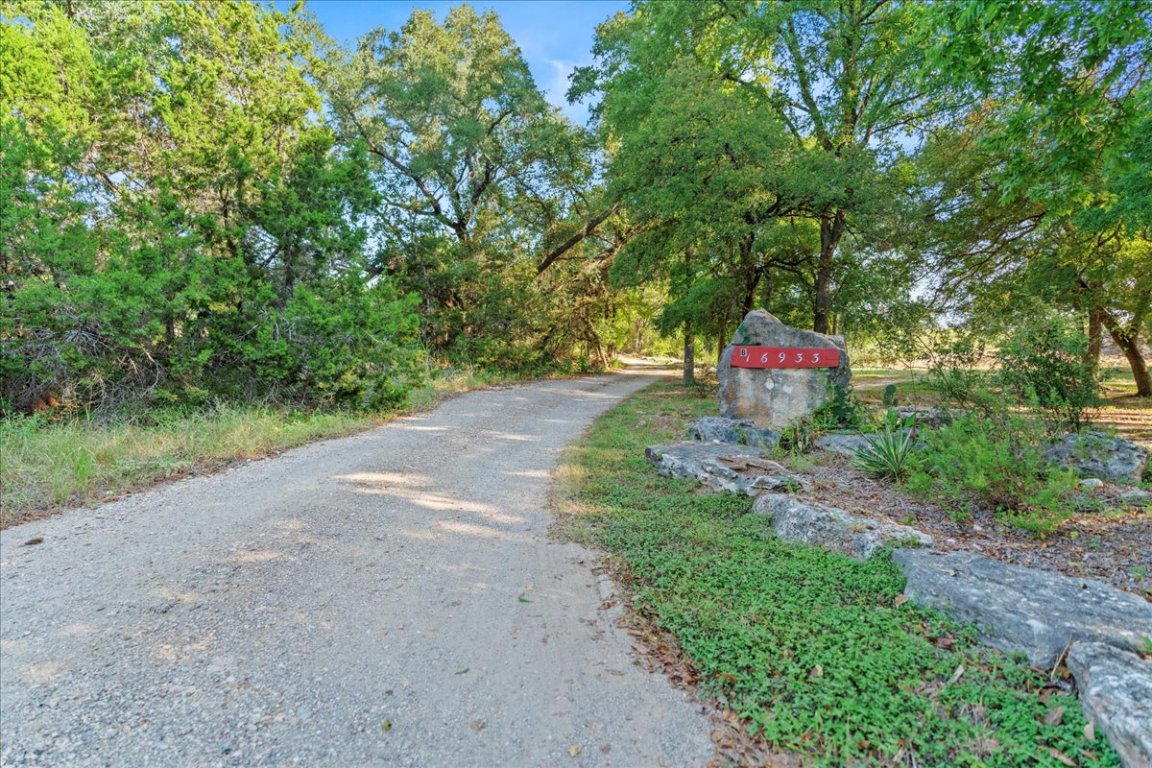 16933 B Ranch Road 12, Unit B Wimberley, TX 78676 - Photo 17 of 19 a view of a back yard