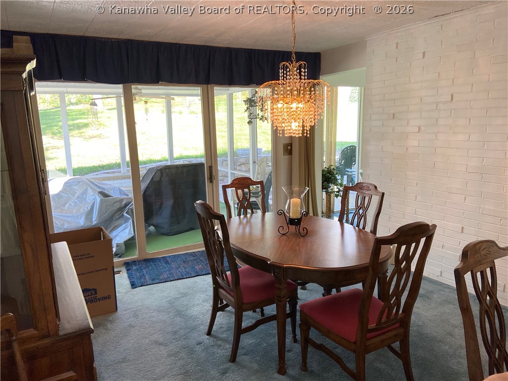 1583 Nottingham Road Charleston, WV 25314 - Photo 8 of 31 Dining room opens onto screen porch