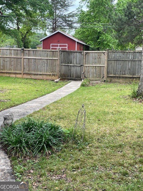 311 3rd Street Manchester, GA 31816 - Photo 51 of 62 a view of a back yard