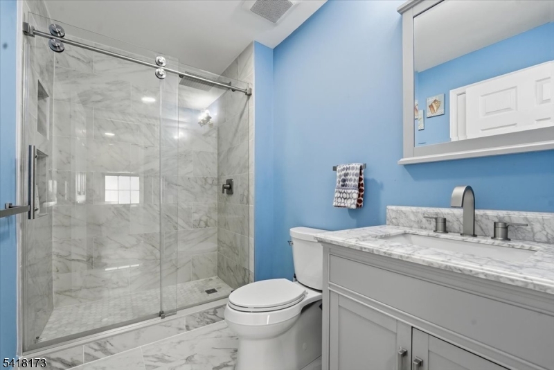 181 Court Street Newark, NJ 07103 - Photo 29 of 38 a bathroom with a sink toilet and shower
