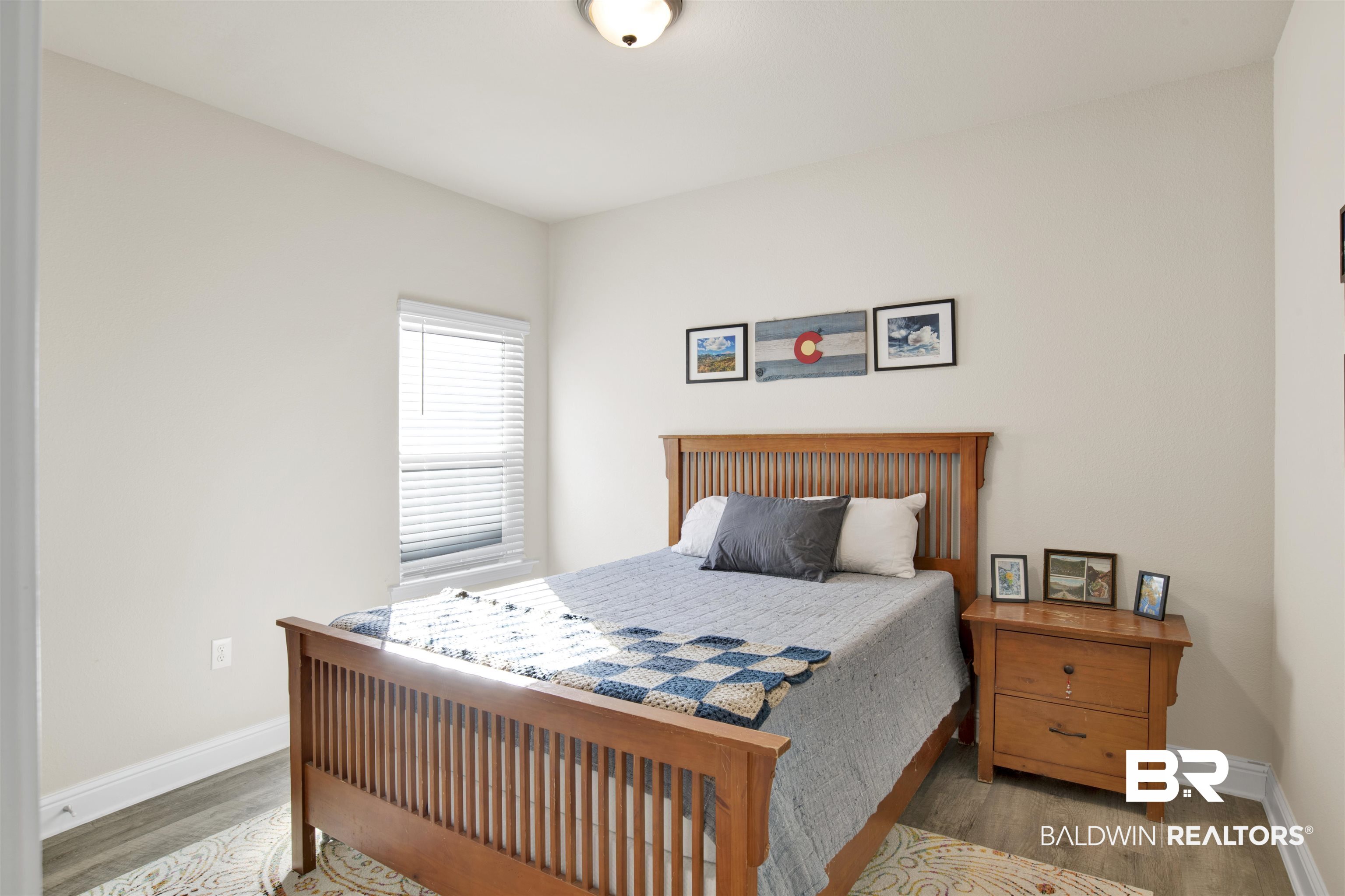 9622 Volterra Avenue Daphne, AL 36526 - Photo 19 of 31 Bedroom with light hardwood / wood-style floors