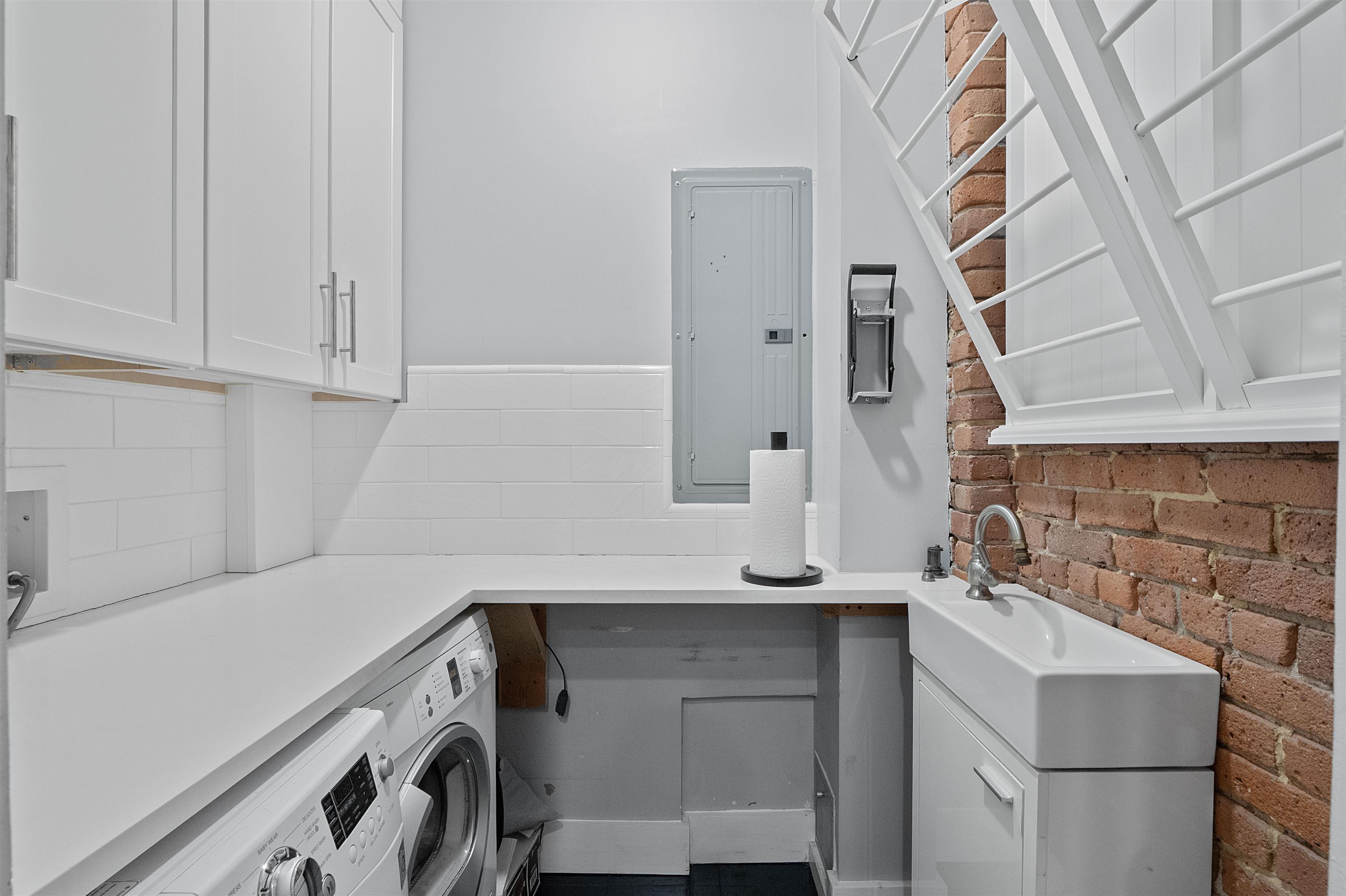 610 Clinton Street, Unit 2A Hoboken, NJ 07030 - Photo 16 of 33 a utility room with dryer and washer