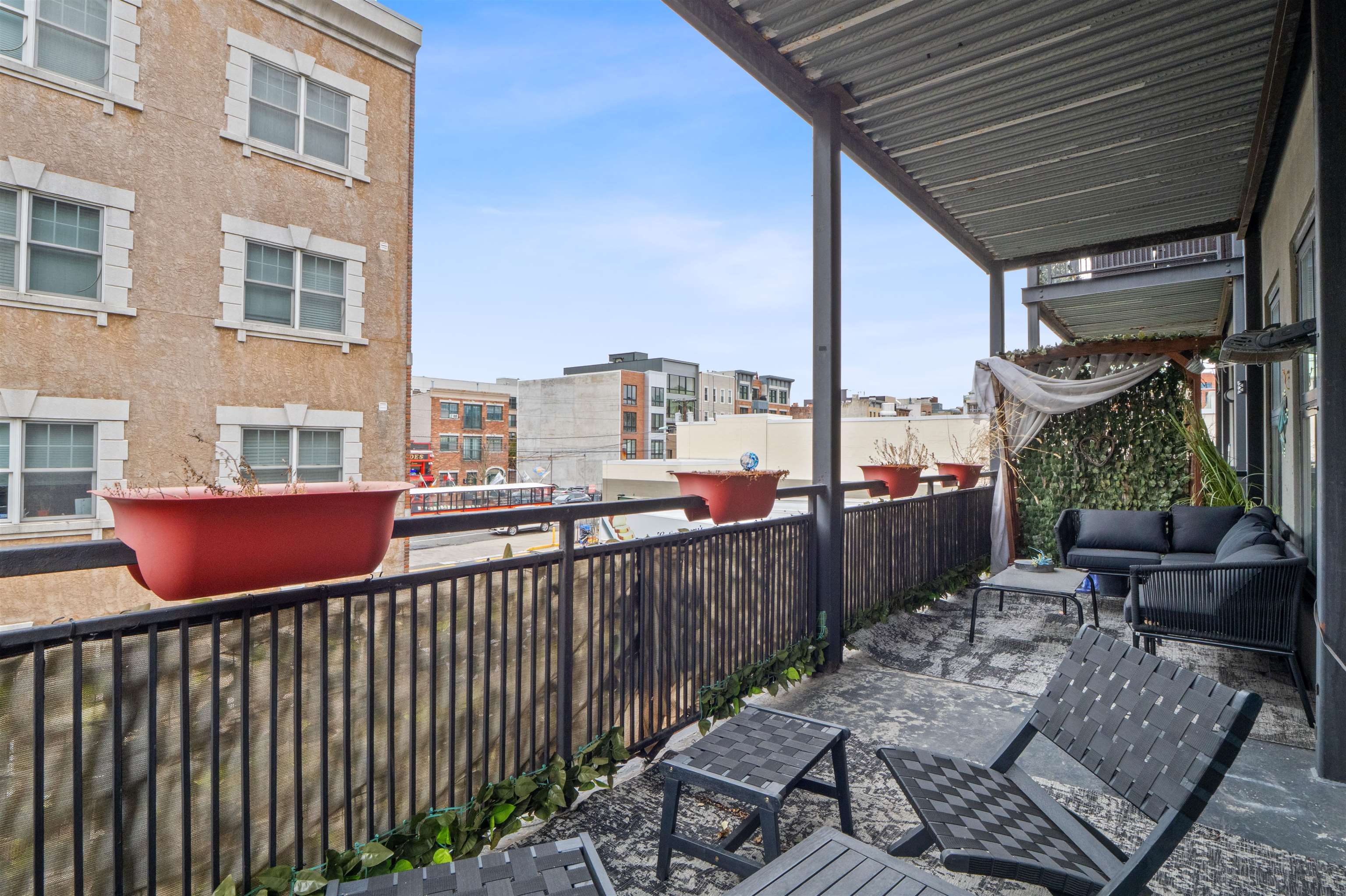610 Clinton Street, Unit 2A Hoboken, NJ 07030 - Photo 2 of 33 a balcony with wooden floor