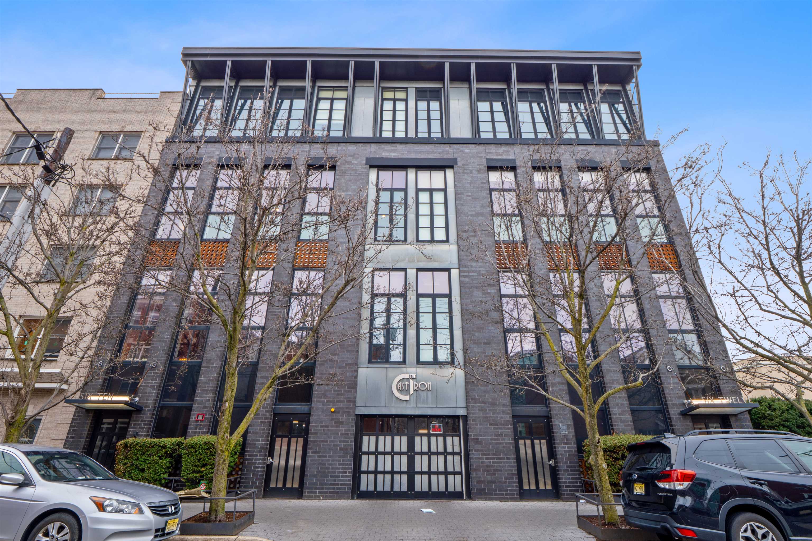 610 Clinton Street, Unit 2A Hoboken, NJ 07030 - Photo 33 of 33 a front view of a building with parking space