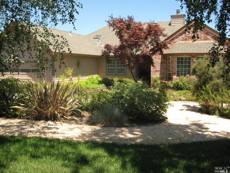 2447 Laguna Road Santa Rosa, CA 95401 - Photo 1 of 1 a front view of a house with a yard