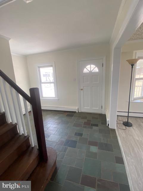 20773 Atlanta Road, Unit 87 Seaford, DE 19973 - Photo 13 of 20 a view of an empty room with wooden floor and a window
