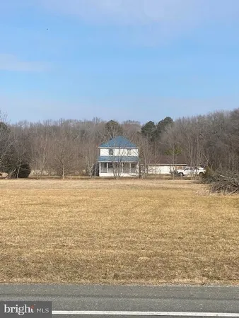 a view of lake with sunset