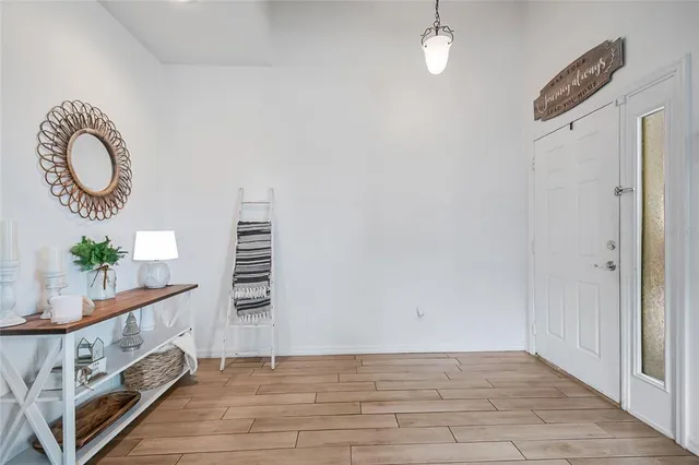 a view of a hallway with entryway