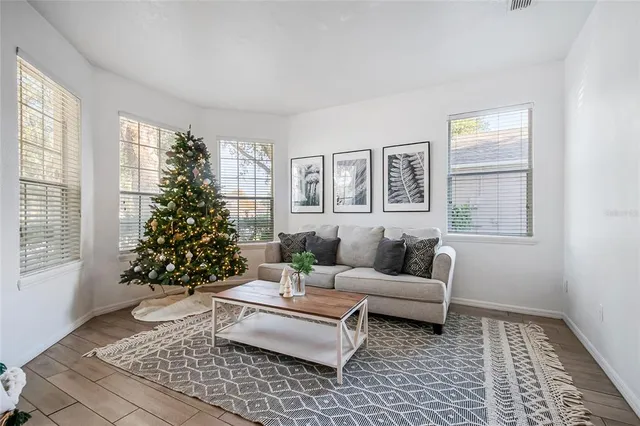 a living room with furniture and window