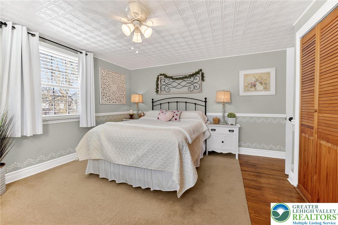 926 Buttonwood Street Emmaus, PA 18049 - Photo 21 of 63 a bedroom with a bed and a window