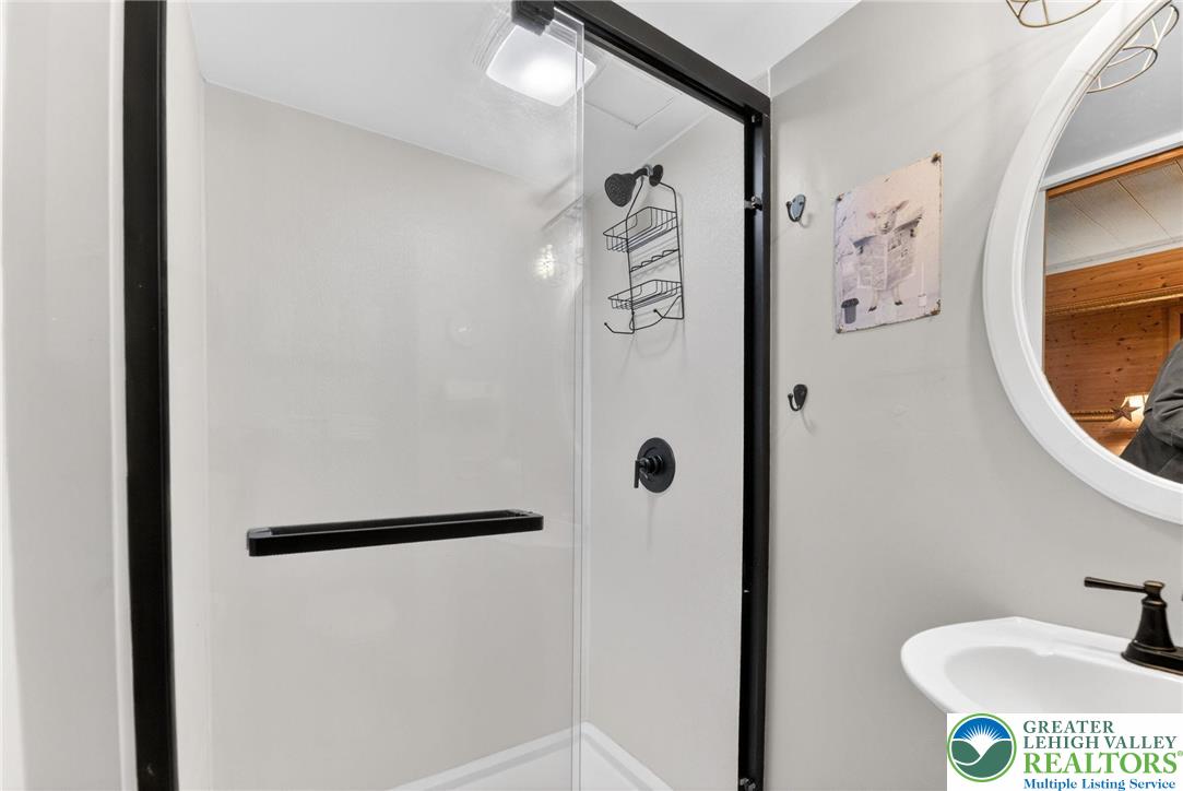 926 Buttonwood Street Emmaus, PA 18049 - Photo 44 of 63 a bathroom with a sink and a mirror