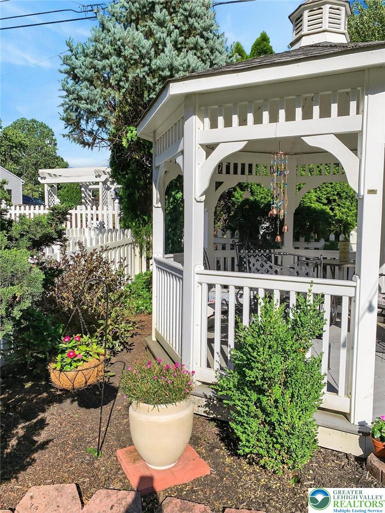 926 Buttonwood Street Emmaus, PA 18049 - Photo 50 of 63 a front view of a house with plants