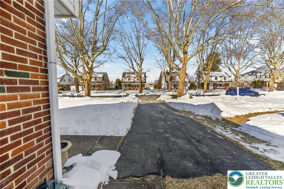 926 Buttonwood Street Emmaus, PA 18049 - Photo 58 of 63 a view of residential houses with yard and trees