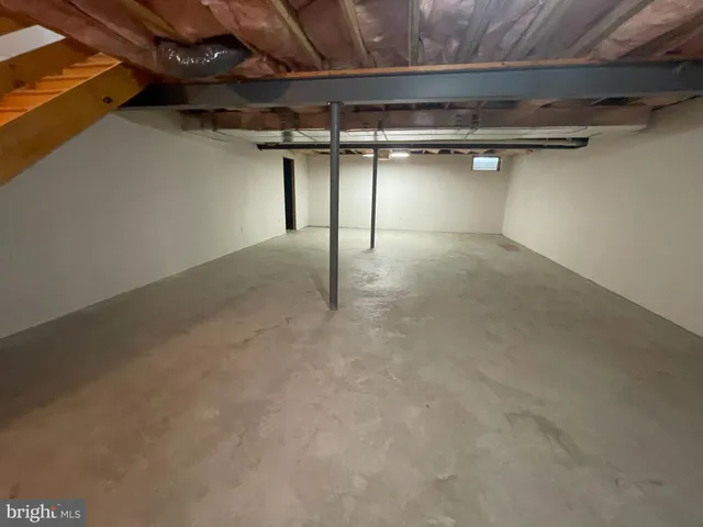 a view of a room with an empty space