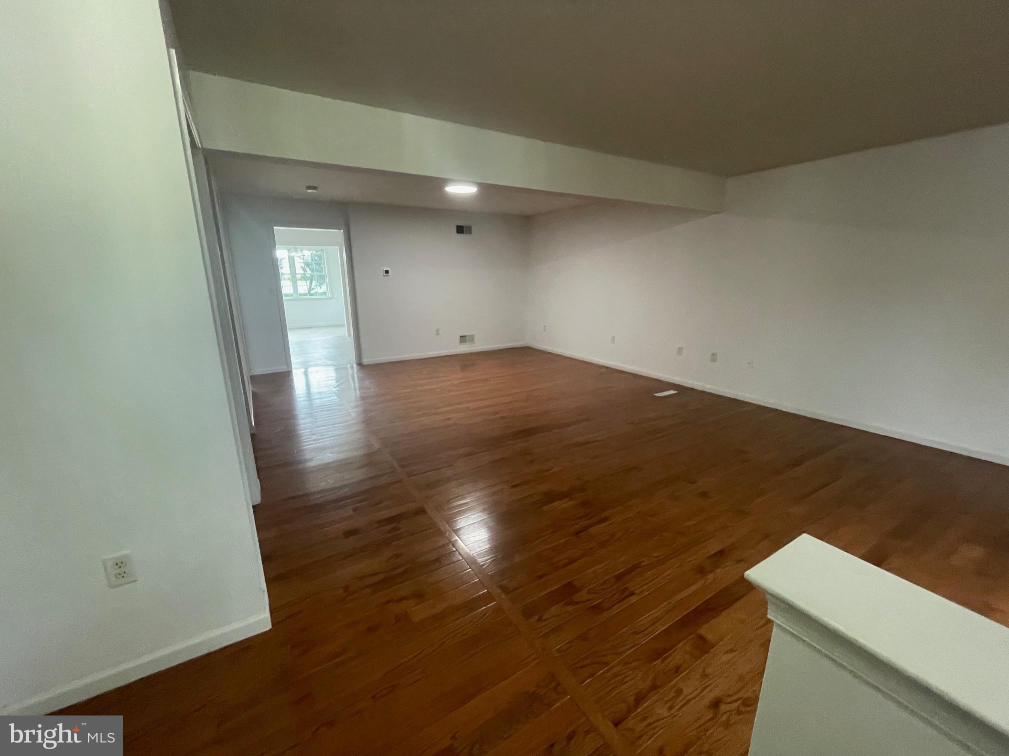 115 Springbrook Court Lancaster, PA 17603 - Photo 3 of 20 Spacious, sunlit room with polished floors.