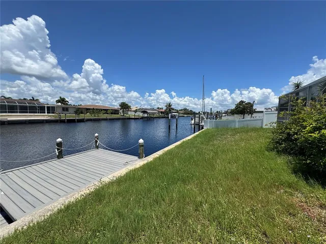a view of a lake with sitting area