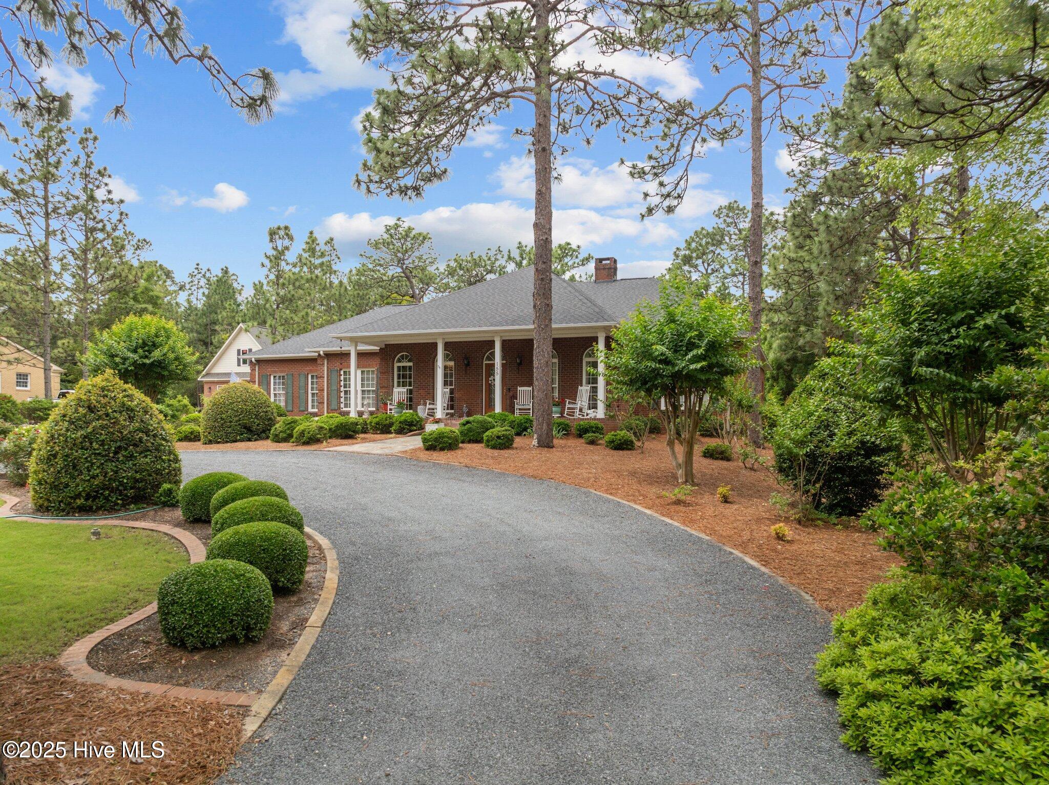155 McKenzie Road East Pinehurst, NC 28374 - Photo 4 of 42 Driveway with parking