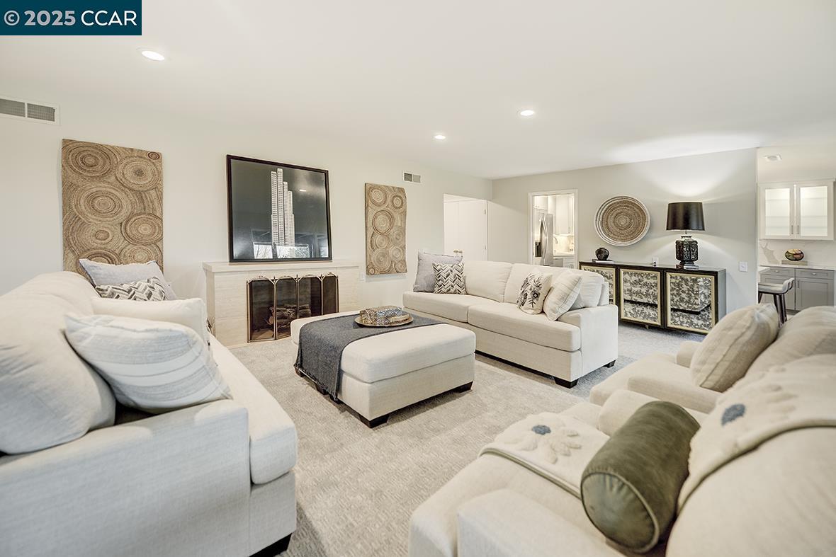 2900 Tice Creek Drive, Unit 1 & 3 Walnut Creek, CA 94595 - Photo 25 of 58 a living room with furniture and a large window