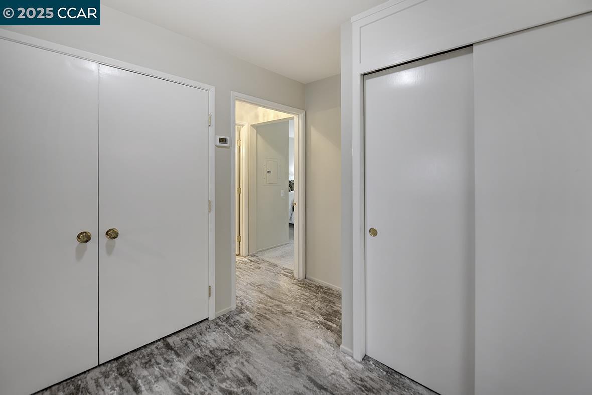 2900 Tice Creek Drive, Unit 1 & 3 Walnut Creek, CA 94595 - Photo 27 of 58 a view of a bathroom with a glass door