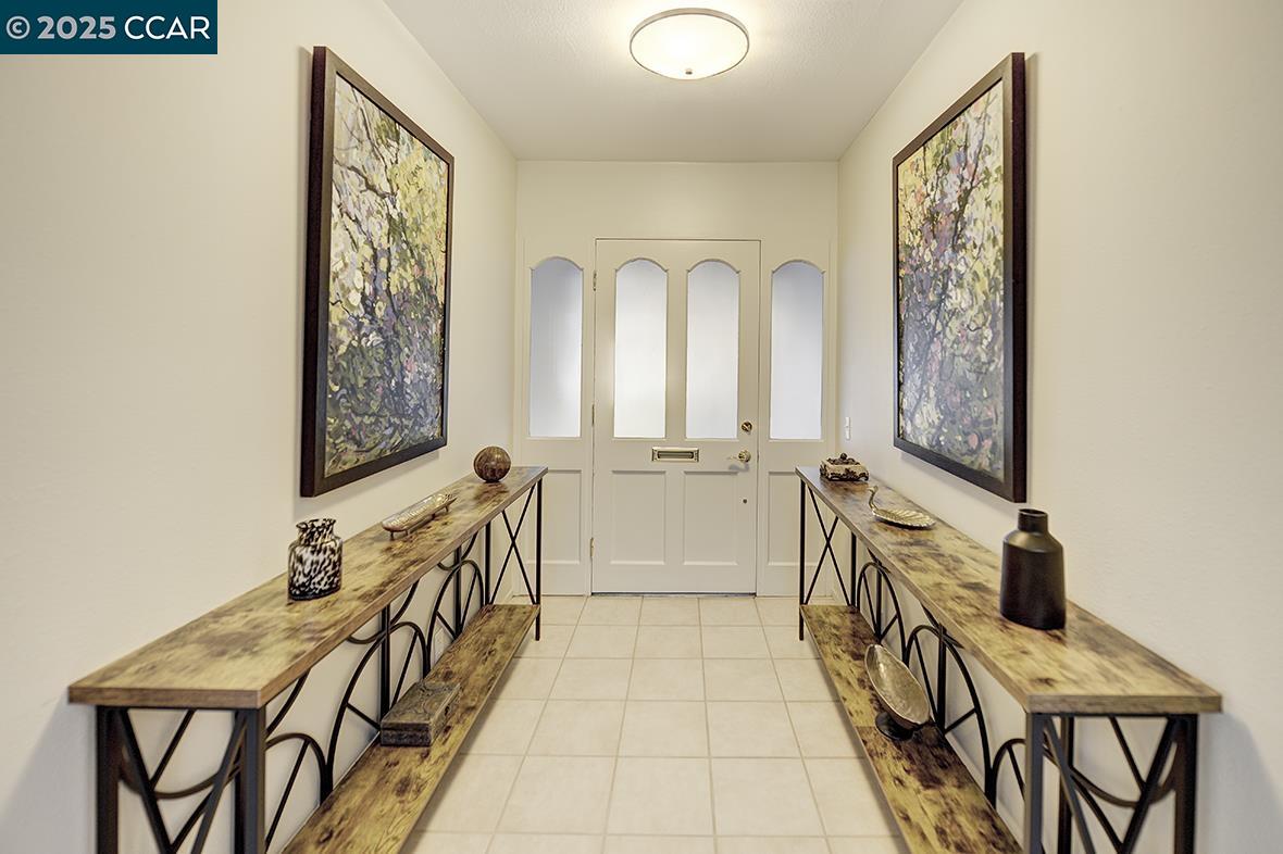 2900 Tice Creek Drive, Unit 1 & 3 Walnut Creek, CA 94595 - Photo 53 of 58 a view of a hallway with wooden floor and entryway