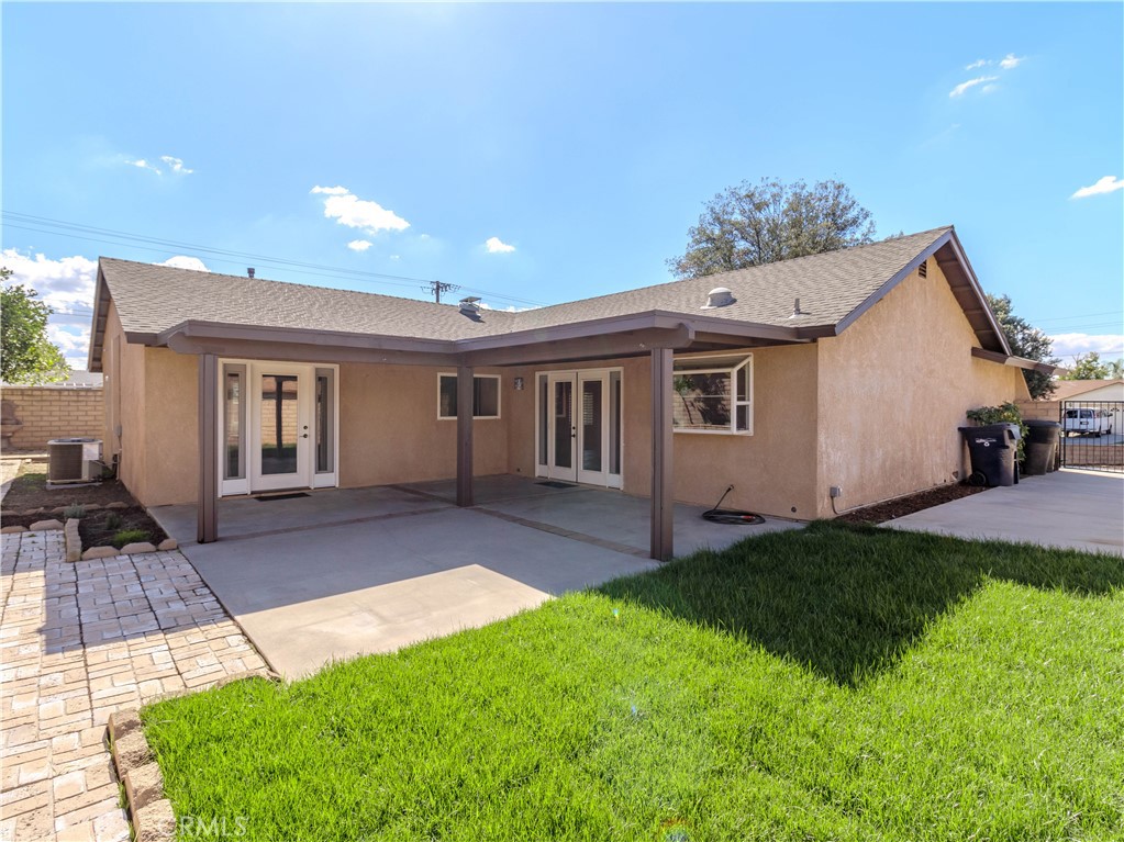 802 Renee Street Redlands, CA 92374 - Photo 13 of 18 a view of a house with a patio