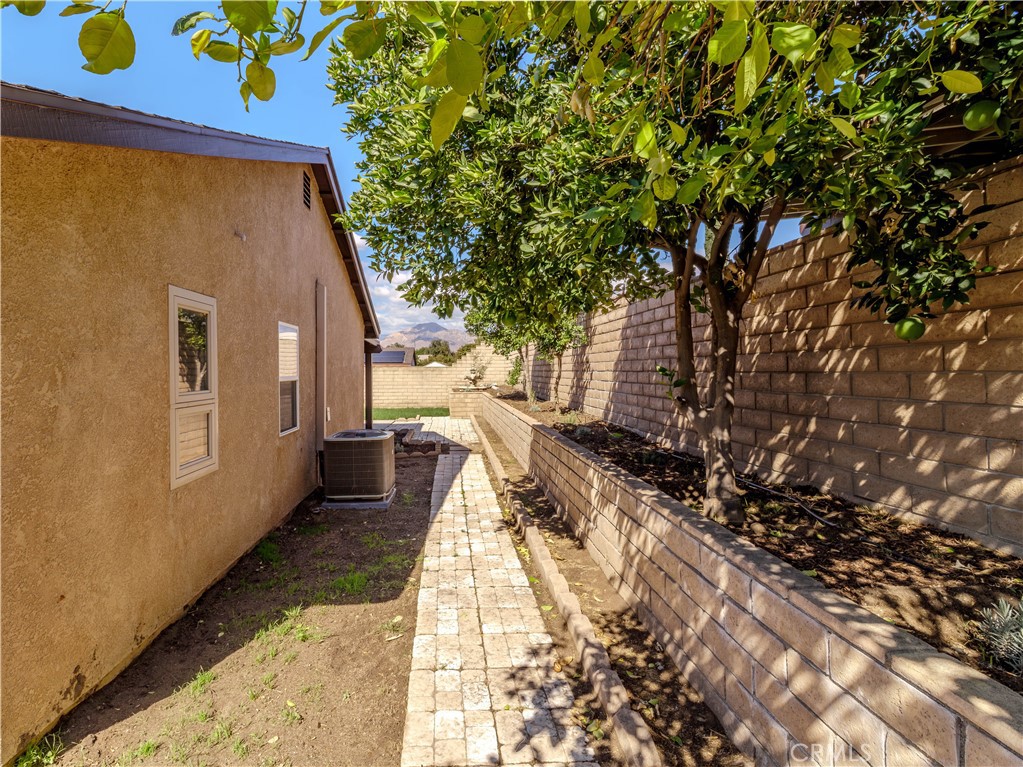 802 Renee Street Redlands, CA 92374 - Photo 16 of 18 a view of house with backyard