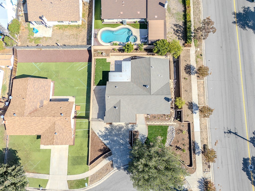 802 Renee Street Redlands, CA 92374 - Photo 17 of 18 aerial view of a house with a yard