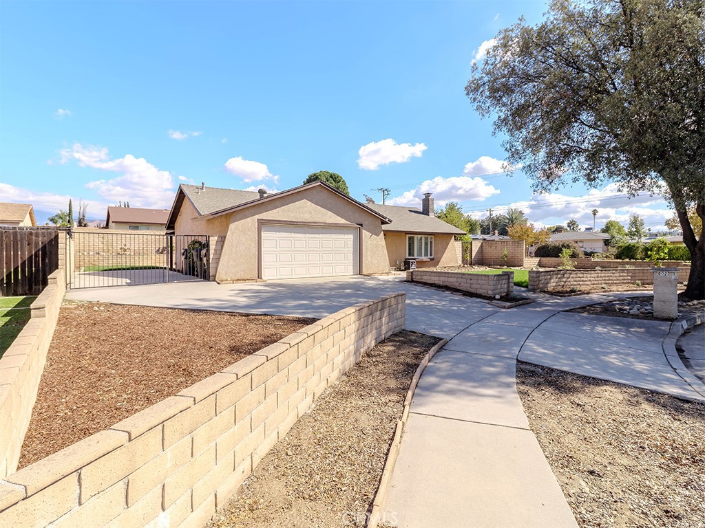 802 Renee Street Redlands, CA 92374 - Photo 2 of 18 a view of a house with a patio