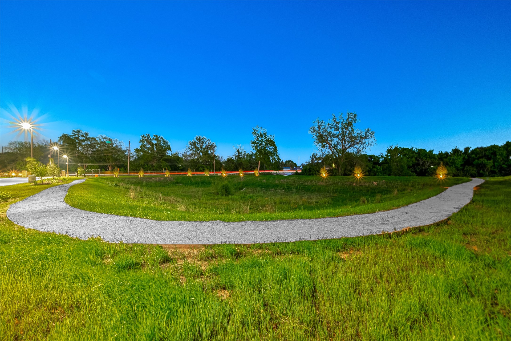 10719 Mason Road, Unit 33 Richmond, TX 77406 - Photo 44 of 50 a view of a golf course with a swimming pool
