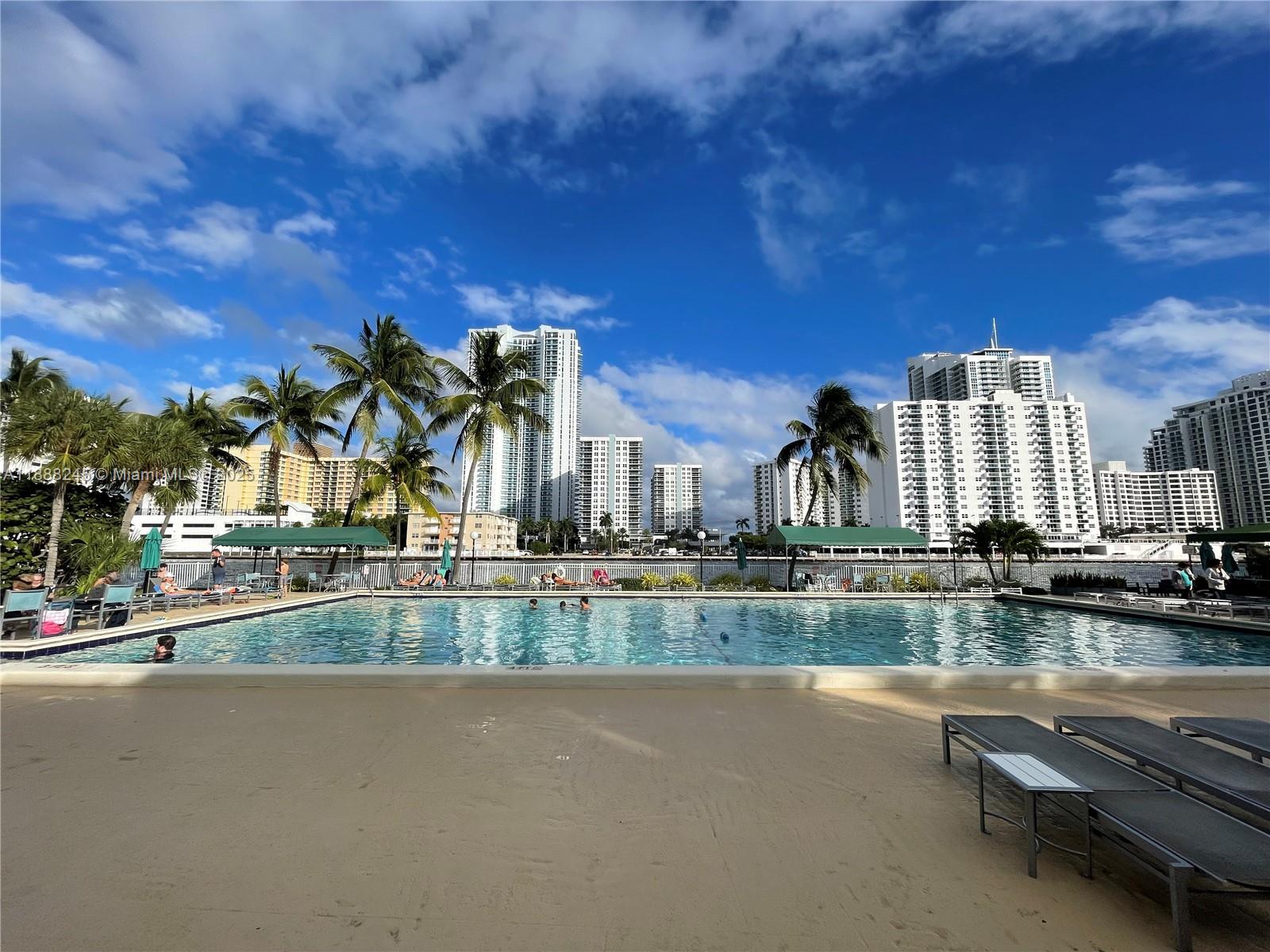 1000 Parkview Drive, Unit 627 Hallandale Beach, FL 33009 - Photo 14 of 27 a view of a lake with a building in the background