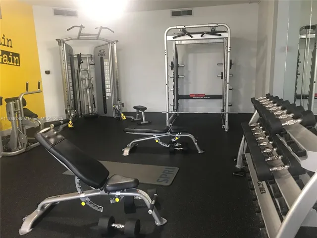 a picture of a table with chairs