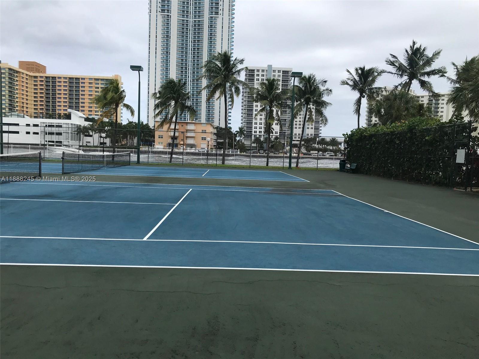 1000 Parkview Drive, Unit 627 Hallandale Beach, FL 33009 - Photo 21 of 27 a view of a tennis court