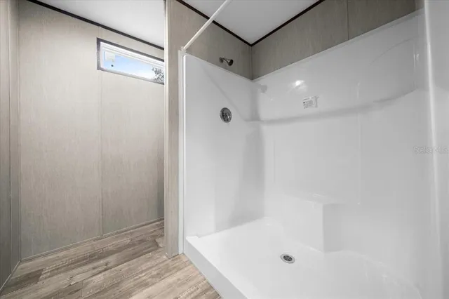 a bathroom with a white bath tub