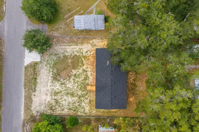 a brick building with a yard