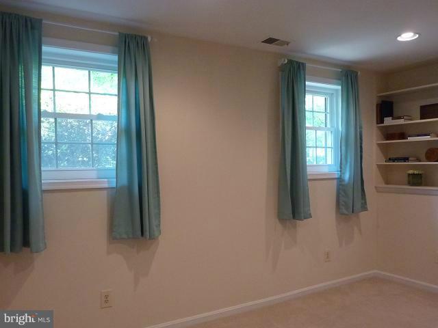 12351 Lima Lane Reston, VA 20191 - Photo 11 of 28 a view of empty room with windows