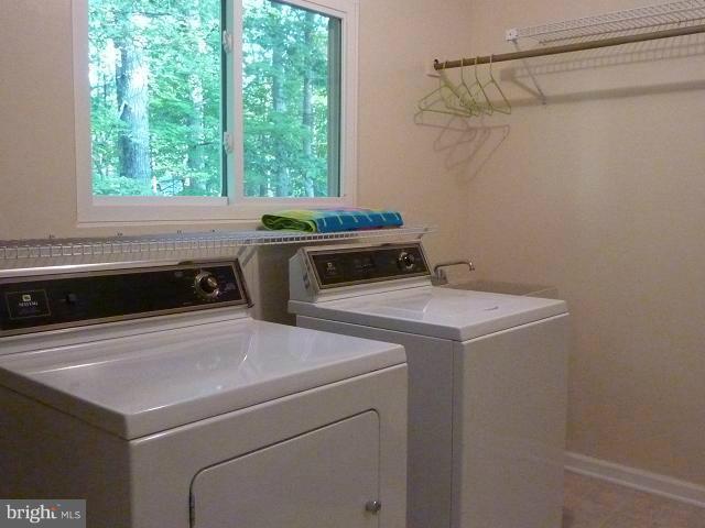 12351 Lima Lane Reston, VA 20191 - Photo 17 of 28 a utility room with dryer and washer