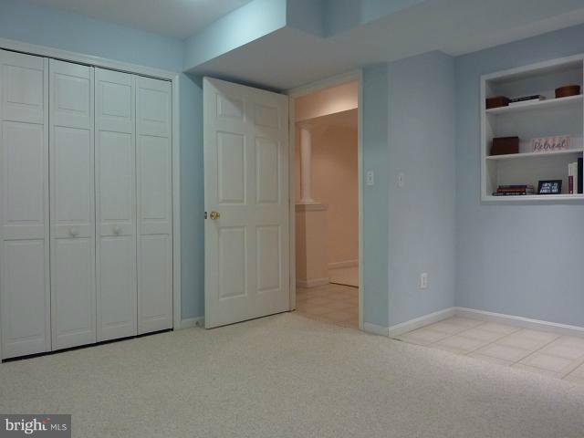 12351 Lima Lane Reston, VA 20191 - Photo 19 of 28 an empty room with shelves