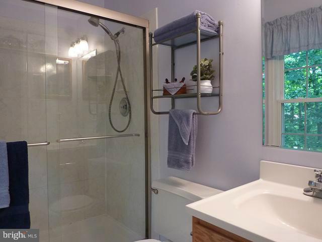 12351 Lima Lane Reston, VA 20191 - Photo 3 of 28 a bathroom with a shower