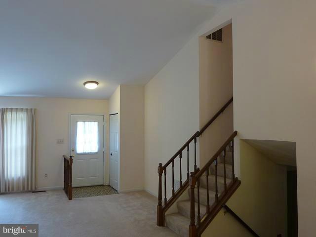 12351 Lima Lane Reston, VA 20191 - Photo 23 of 28 a view of a hallway with windows
