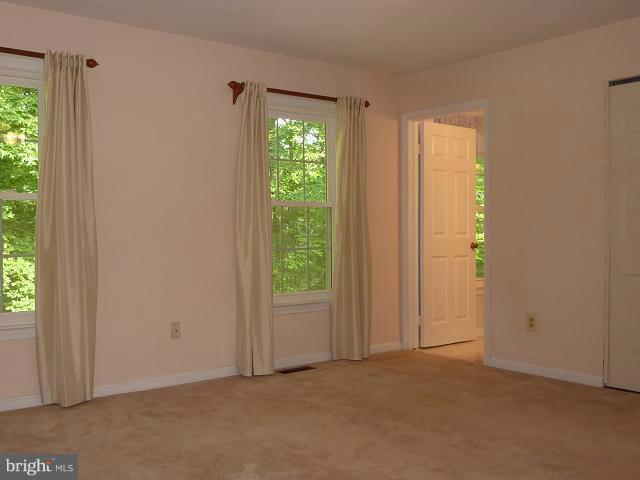 12351 Lima Lane Reston, VA 20191 - Photo 24 of 28 an empty room with windows and closet