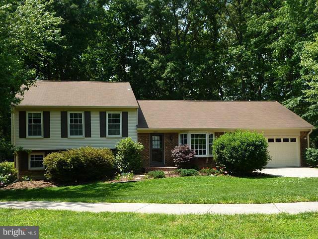 12351 Lima Lane Reston, VA 20191 - Photo 28 of 28 a front view of a house with a garden