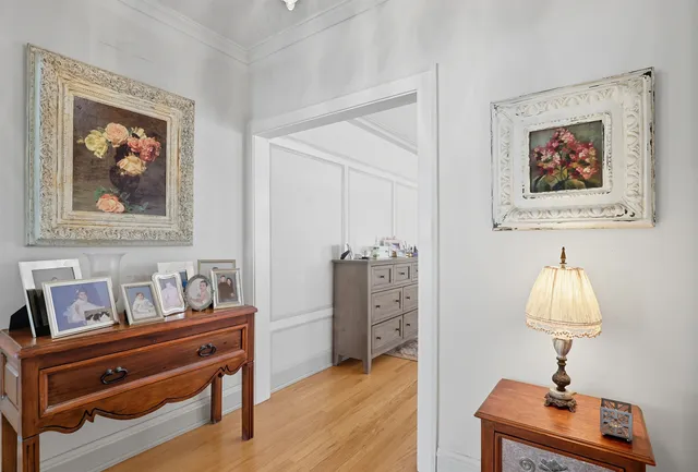 a room with furniture and a lamp