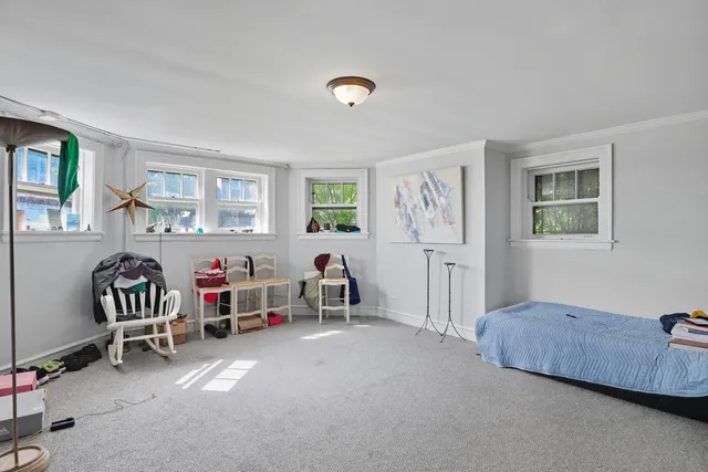 a view of livingroom with furniture and windows