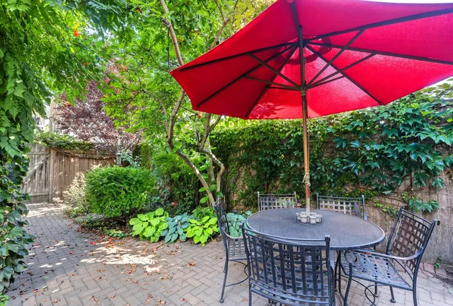 a view of yard with patio