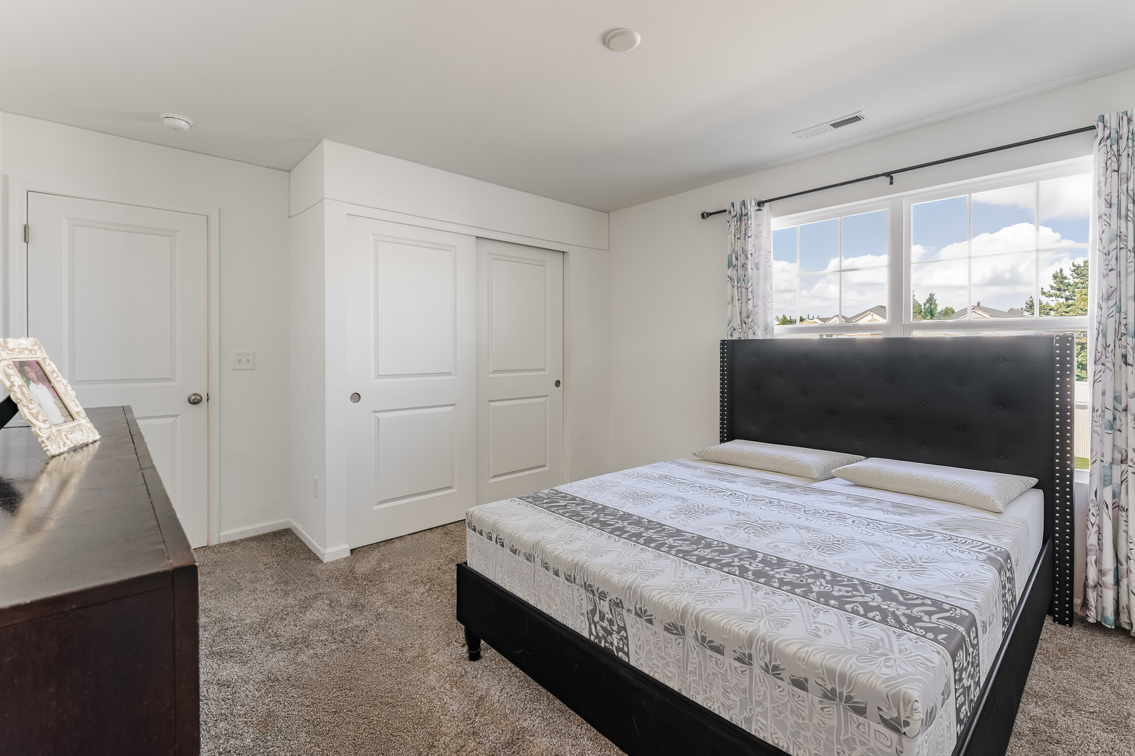 482 Comstock Road South Elgin, IL 60177 - Photo 21 of 23 a bedroom with a bed and a window