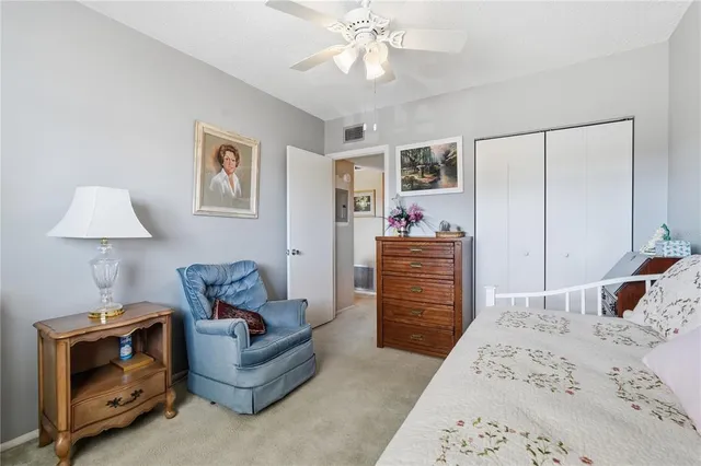 a bedroom with a bed and furniture