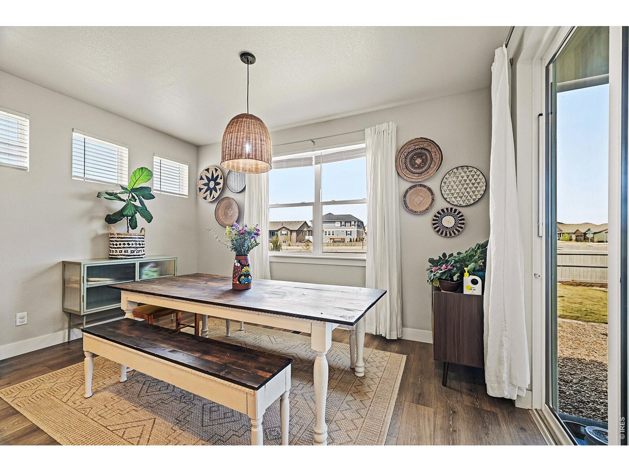 1699 Rivergate Way Berthoud, CO 80513 - Photo 11 of 45 a living room with furniture and a table