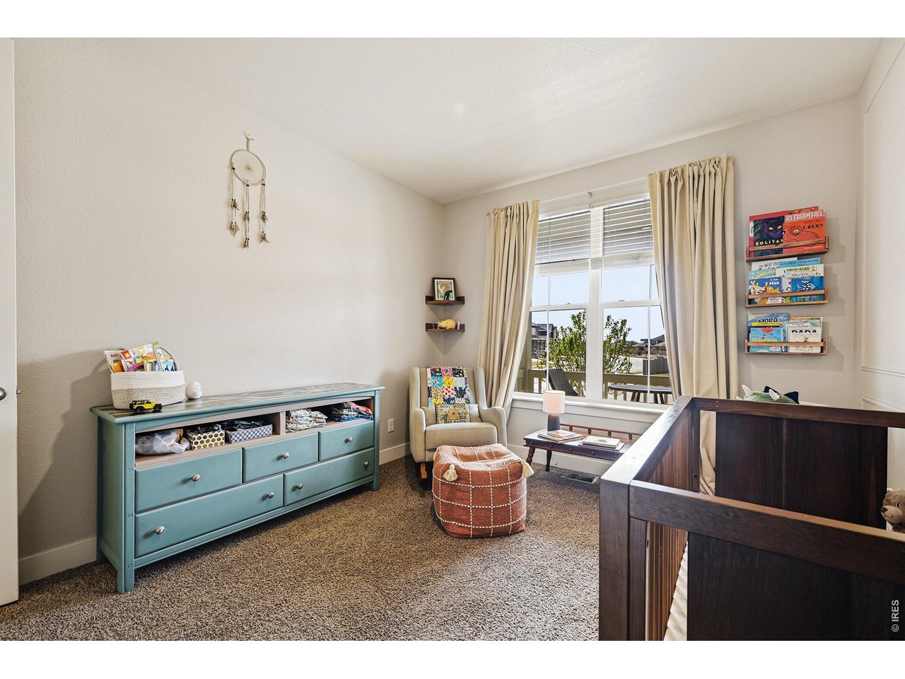 1699 Rivergate Way Berthoud, CO 80513 - Photo 18 of 45 a kitchen that has a sink and a stove