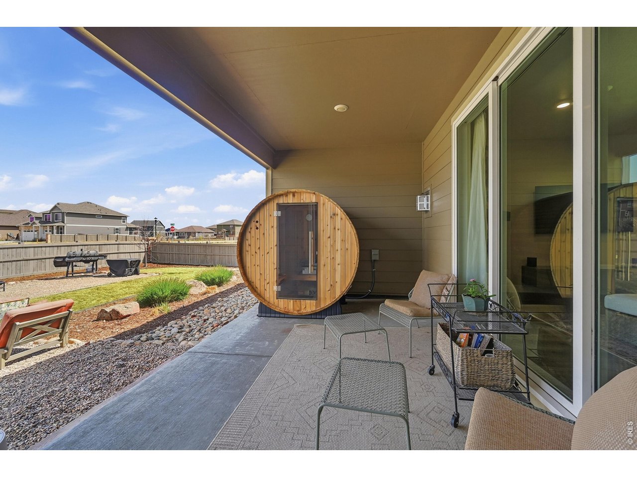 1699 Rivergate Way Berthoud, CO 80513 - Photo 28 of 45 a view of a swimming pool and lounge chairs